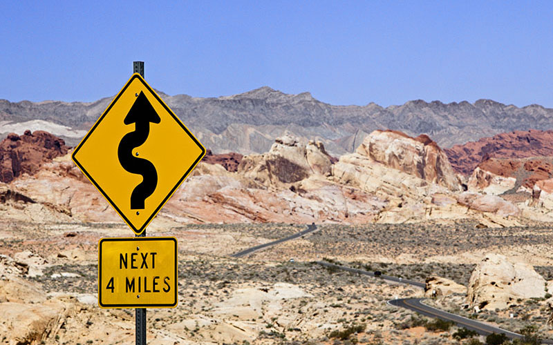Winding road sign